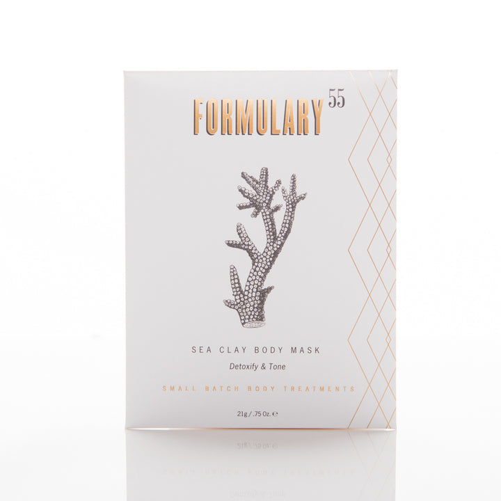 A white, square product package with gold and gray accents. The text reads "FORMULARY 55" at the top, with an illustration of coral in the center. Below are the words "SEA CLAY BODY MASK, Detoxify & Tone, Small Batch Body Treatments." Size noted as 2 oz / 55 g.
